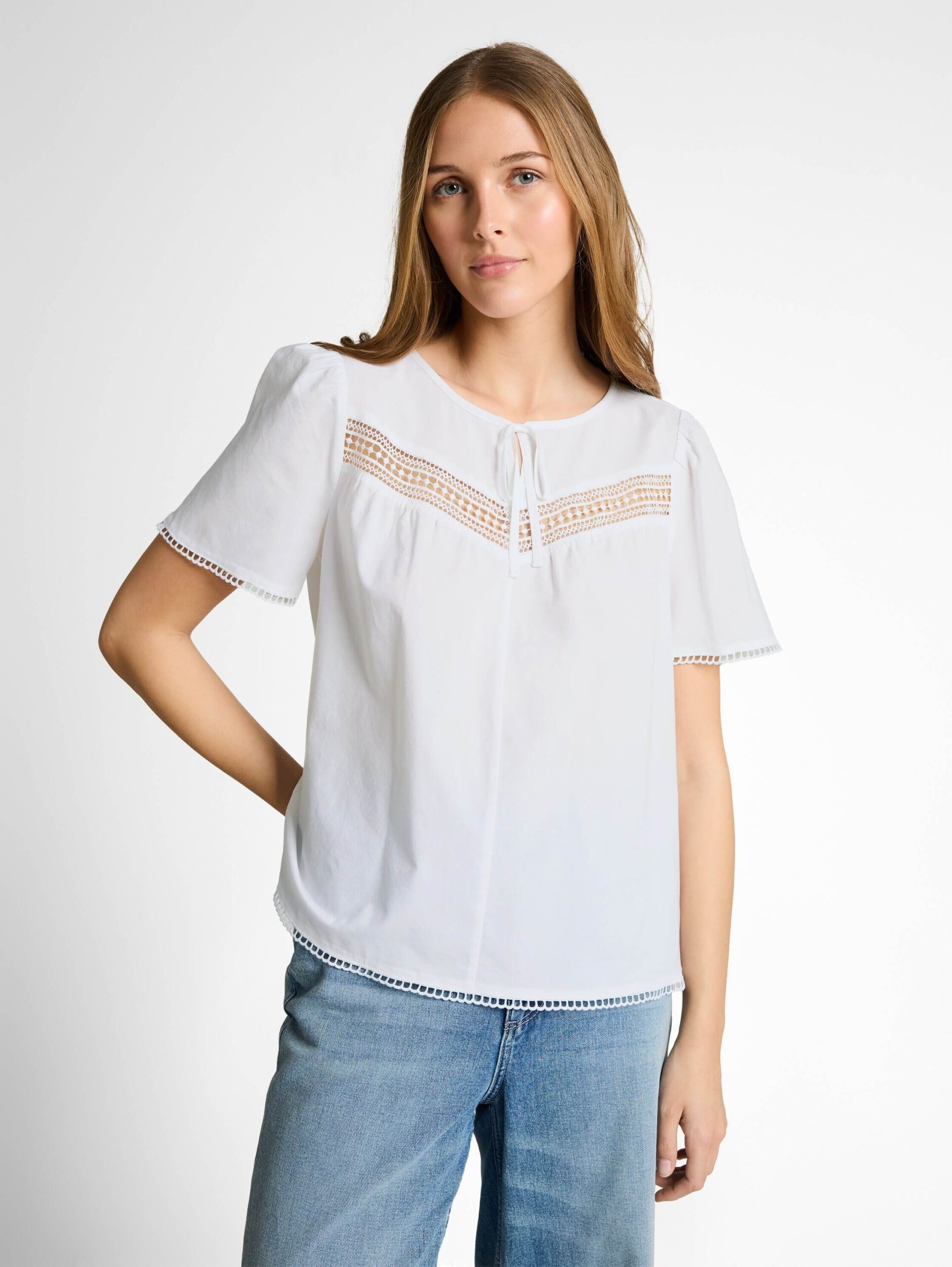 feminine blouse with crochet tapes